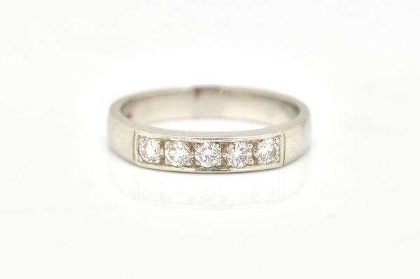 A PLATINUM AND DIAMOND FIVE STONE RING