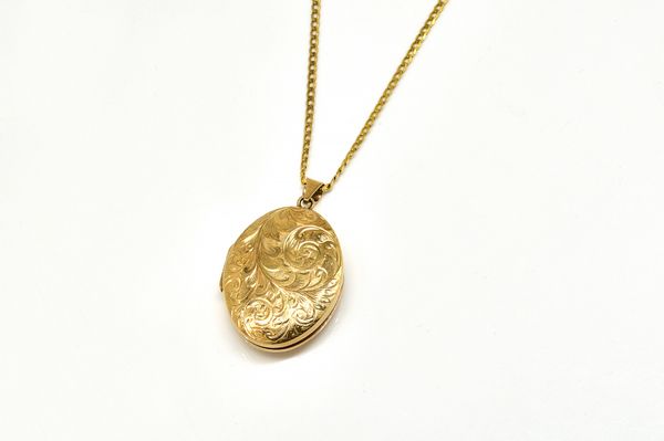 A 9CT GOLD PENDANT LOCKET WITH A 9CT GOLD NECKCHAIN (2)