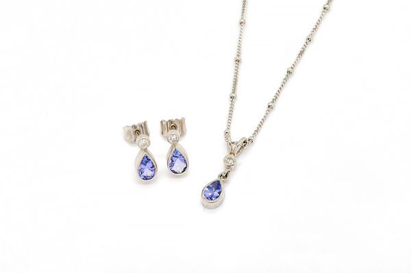 AN 18CT WHITE GOLD, DIAMOND AND TANZANITE PENDANT NECKLACE AND A MATCHING PAIR OF EARSTUDS (2)