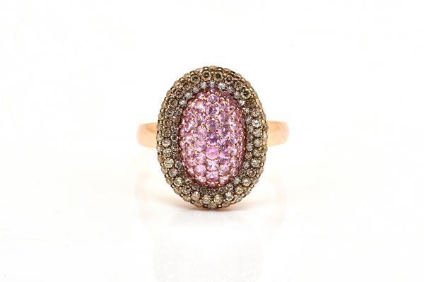 A DIAMOND AND PINK SAPPHIRE RING