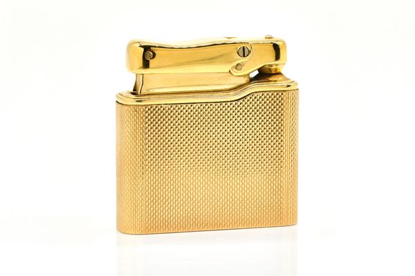 A 9CT GOLD CASED COLIBRI LIGHTER