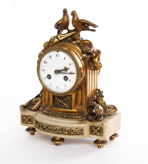 A FRENCH LOUIS XVI STYLE GILT-METAL MARBLE MOUNTED MANTEL CLOCK