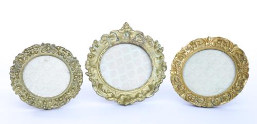 THREE FRENCH ORMOLU FOLIATE RELIEF CAST PORTRAIT FRAMES (3)