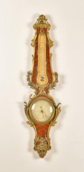 A LOUIS XV STYLE ORMOLU-MOUNTED KINGWOOD BAROMETER