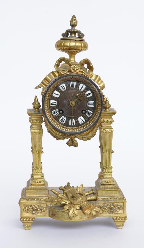 A FRENCH LOUIS XVI STYLE GILT-METAL MANTEL CLOCK