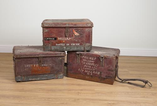 THREE LEATHER MILITARY TRUNKS (3)