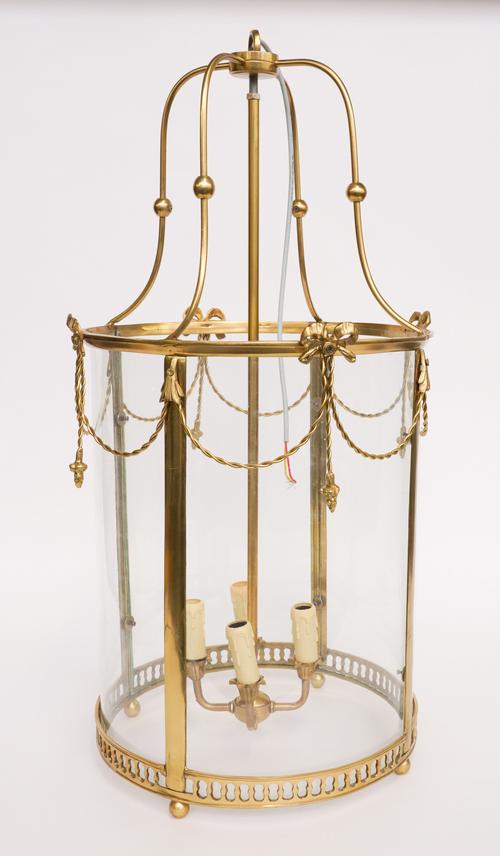 A NEO-CLASSICAL STYLE FOUR LIGHT BRASS AND GLASS HANGING LANTERN