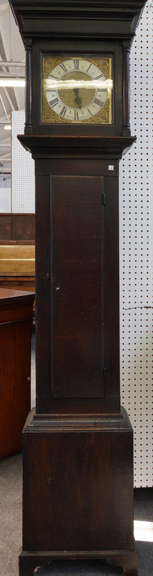 A 30 HOUR BRASS DIAL OAK LONGCASE CLOCK