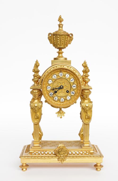VASSY JEURE, PARIS: AN EMPIRE STYLE ORMOLU PORTICO MANTEL CLOCK