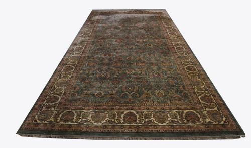 A VERY LARGE MODERN INDIAN CARPET