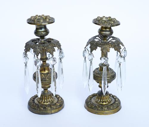 A PAIR OF REGENCY GILT-BRASS FOLIATE CAST CANDLESTICKS (2)