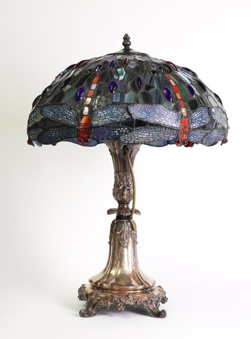 A SILVER-PLATED TABLE LAMP BASE WITH TIFFANY STYLE SHADE