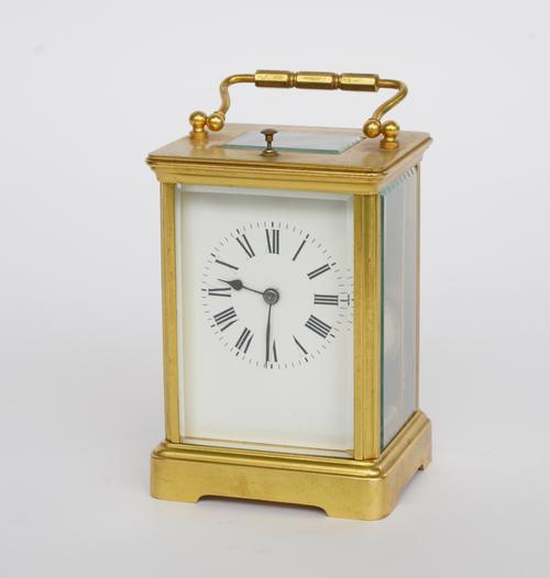 A FRENCH BRASS REPEATING CARRIAGE CLOCK