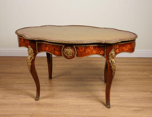 A LOUIS XV STYLE GILT-METAL MOUNTED, ROSEWOOD, MAHOGANY AND MARQUETRY SERPENTINE-SHAPED CENTRE TABLE