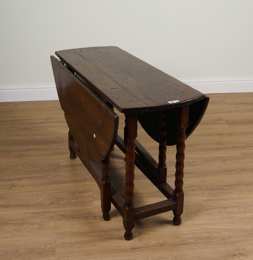 A 17TH CENTURY AND LATER OAK GATELEG TABLE
