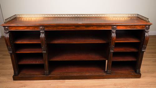 AN EARLY VICTORIAN ROSEWOOD OPEN BOOKCASE WITH THREE-QUARTER PIERCED BRASS GALLERY
