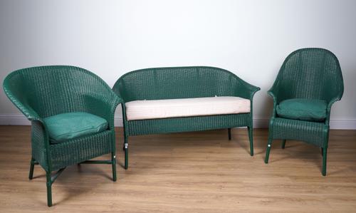 LLOYD LOOM FURNITURE LTD; A GREEN PAINTED THREE PIECE SUITE (3)