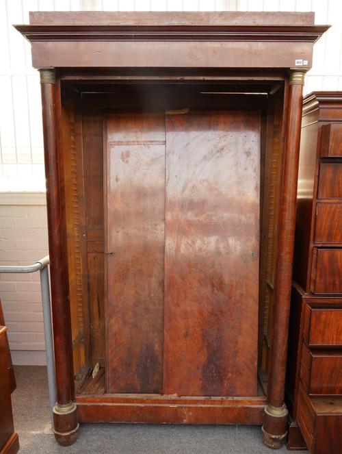 A FRENCH EMPIRE REVIVAL MAHOGANY AND GILT-METAL MOUNTED ARMOIRE OR WARDROBE
