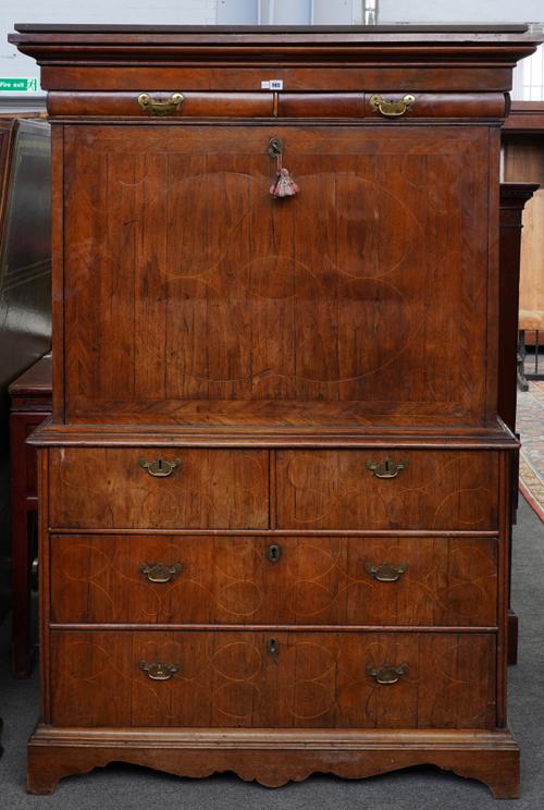 AN EARLY 18TH CENTURY INLAID WALNUT SECRETAIRE  CABINET-ON-CHEST