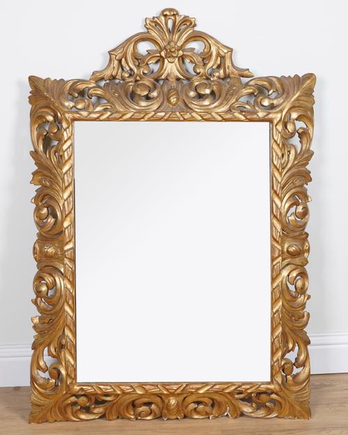 AN EARLY 20TH CENTURY ACANTHUS SCROLL DECORATED GILT FRAME