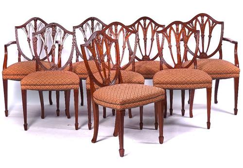 A SET OF EIGHT HEPPLEWHITE STYLE MAHOGANY DINING CHAIRS