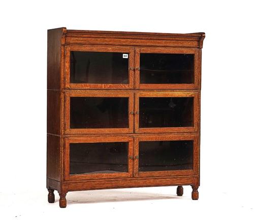 MINTY; AN OAK FLOOR STANDING DISPLAY CABINET