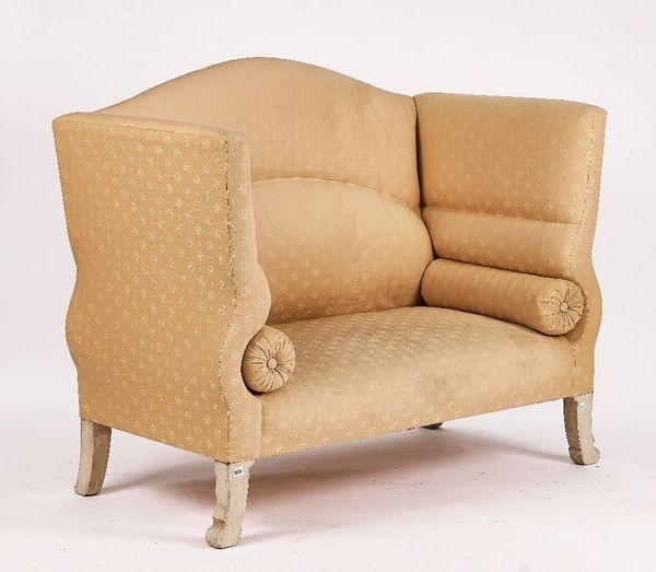 A HIGH HUMP AND WING BACK SOFA