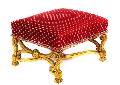 A GEORGE II STYLE GILT FRAMED FOOTSTOOL