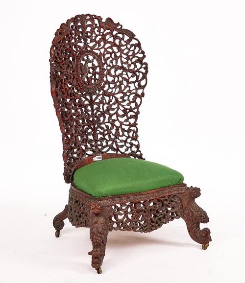 A 19TH CENTURY BURMESE HARDWOOD HIGH-BACK CHAIR
