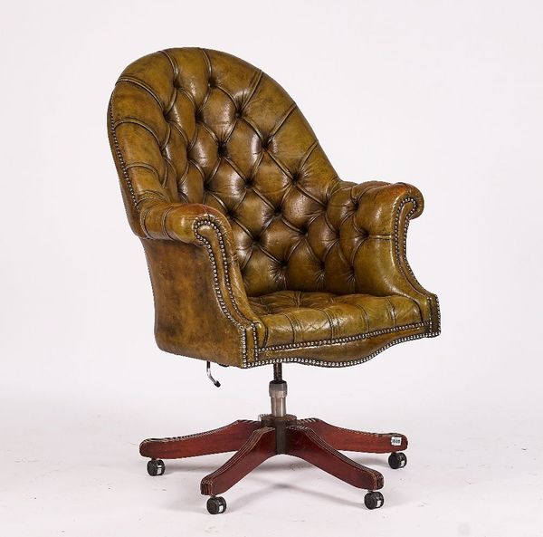 A GREEN LEATHER UPHOLSTERED TUB BACK OFFICE CHAIR