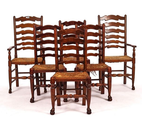 A MATCHED SET OF SIX ASH AND OAK LANCASHIRE LADDERBACK DINING CHAIRS (6)