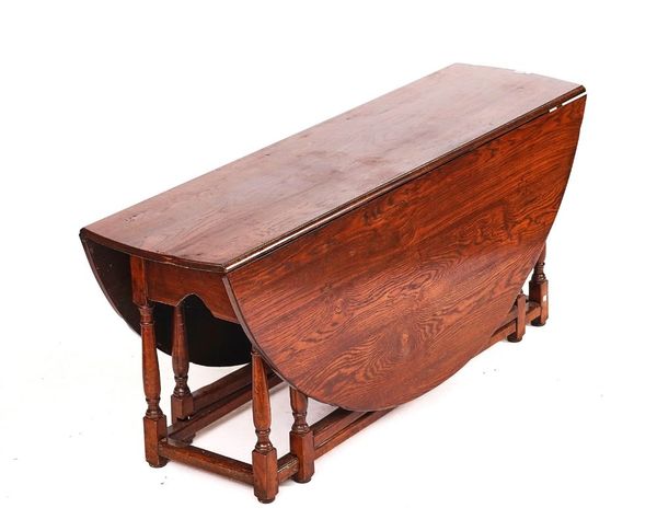 A 17TH CENTURY STYLE OAK WAKE TABLE