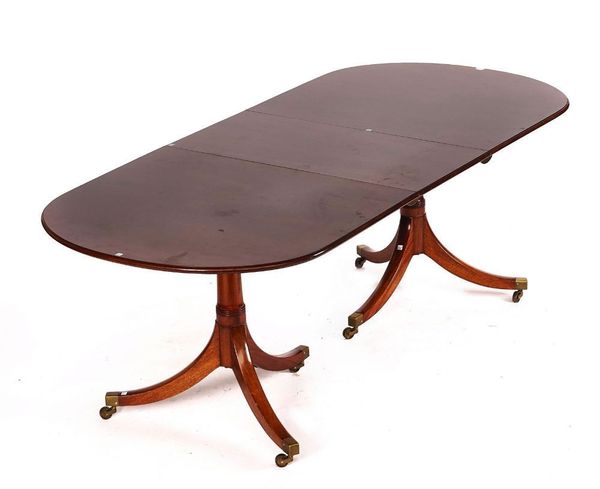 WILLIAM TILLMAN; A GEORGE III STYLE MAHOGANY D-END EXTENDING DINING TABLE