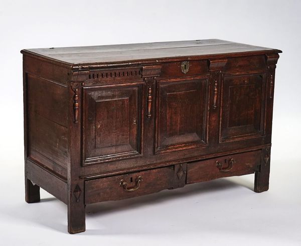 A CHARLES II JOINED OAK PANELLED CHEST