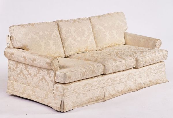 A THREE SEAT SOFA