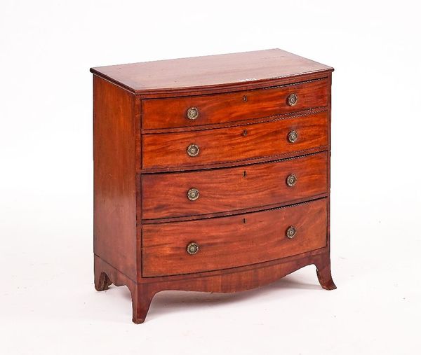 A SMALL EARLY 19TH CENTURY MAHOGANY BOWFRONT CHEST