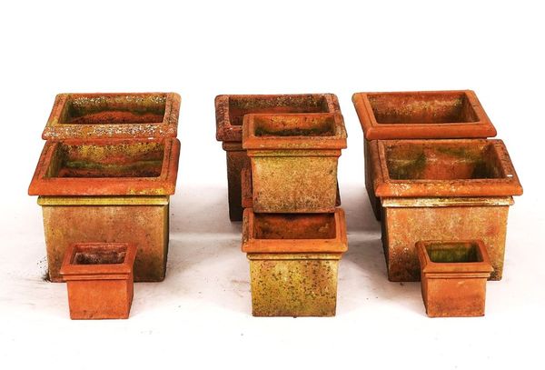 A SET OF FIVE TERRACOTTA SQUARE GARDEN PLANTERS (10)