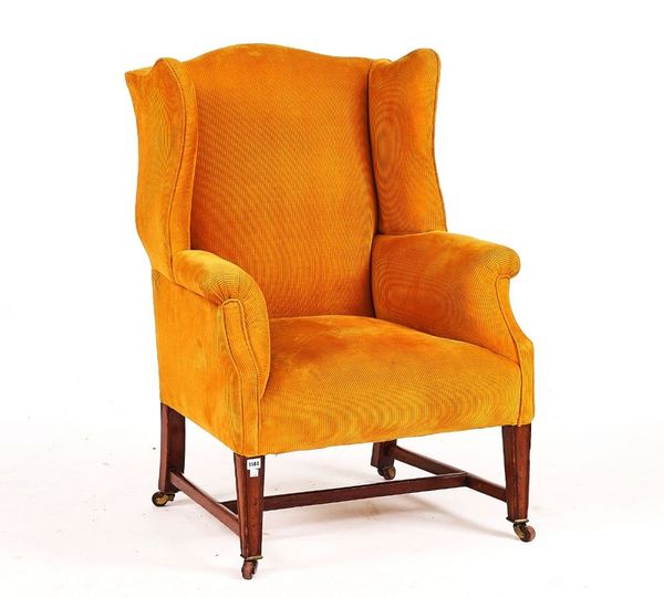 A GEORGE III AND LATER WINGBACK ARMCHAIR