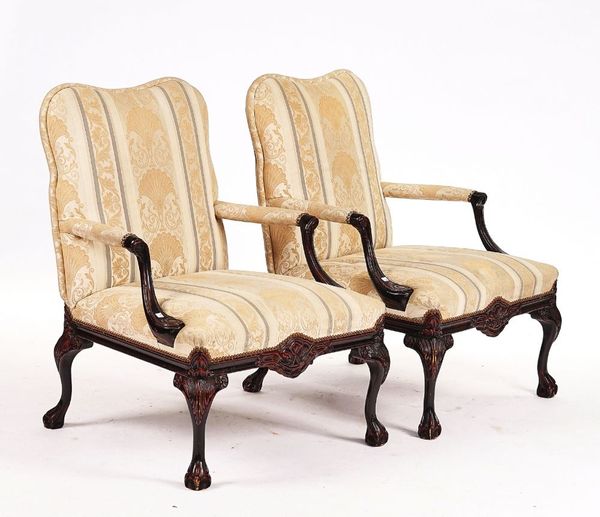 A PAIR OF GEORGE III STYLE GAINSBOROUGH OPEN ARMCHAIRS (2)