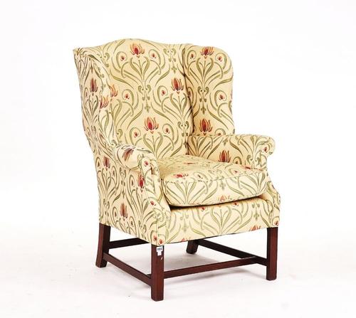 A MID-18TH CENTURY STYLE WINGBACK ARMCHAIR