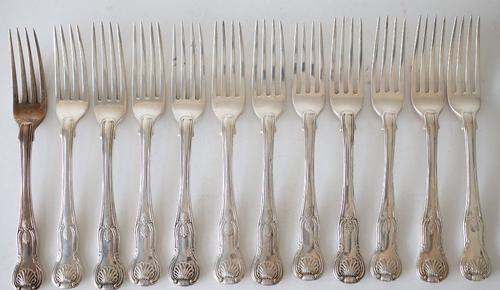 A SET OF TWELVE SILVER KINGS PATTERN DESSERT FORKS