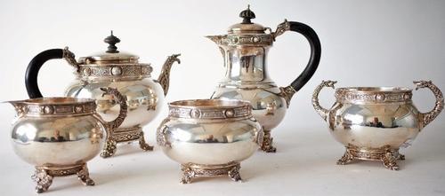 A SILVER COMPOSITE FIVE PIECE IRISH TEA SET (5)