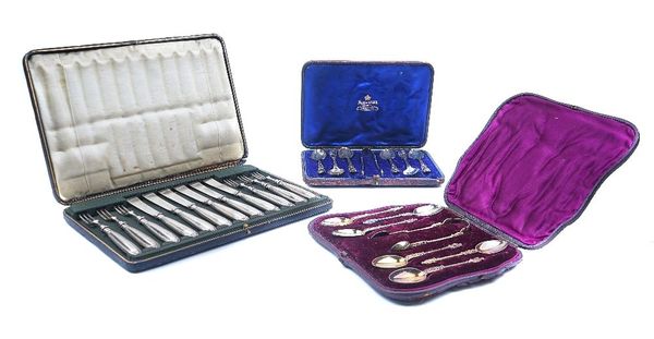 A GROUP OF SILVER AND PLATED FLATWARE CONTAINED IN THREE CASES (3)