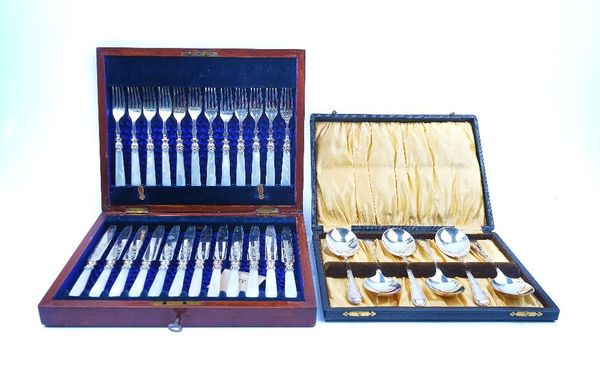 A SET OF TWELVE PAIRS OF PLATED DESSERT OR FRUIT KNIVES AND FORKS AND ONE FURTHER SET (2)