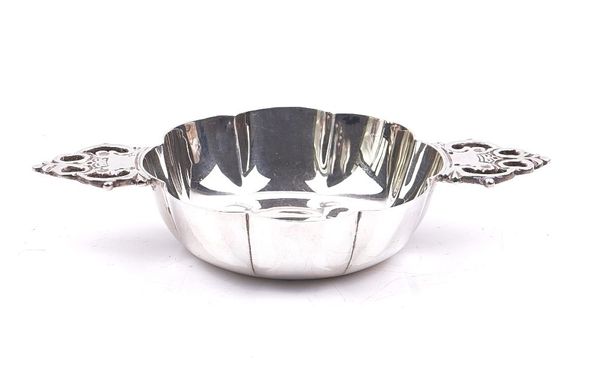 A SILVER TWIN HANDLED BOWL