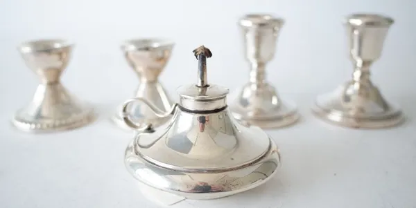 A SILVER CIGAR LIGHTER AND TWO PAIRS OF CANDLESTICKS (3)