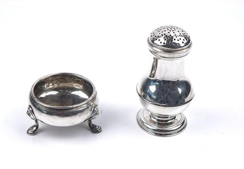 A GEORGE II BALUSTER SHAPED PEPPERETTE AND A GEORGE II CIRCULAR SALT (2)