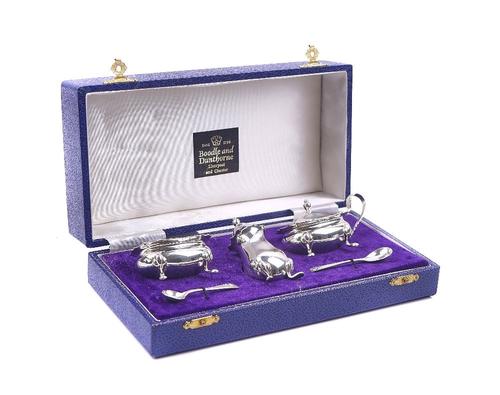 A SILVER MIXED CONDIMENTS SET
