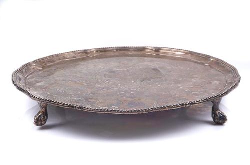 A GEORGE IV SHAPED CIRCULAR SILVER SALVER