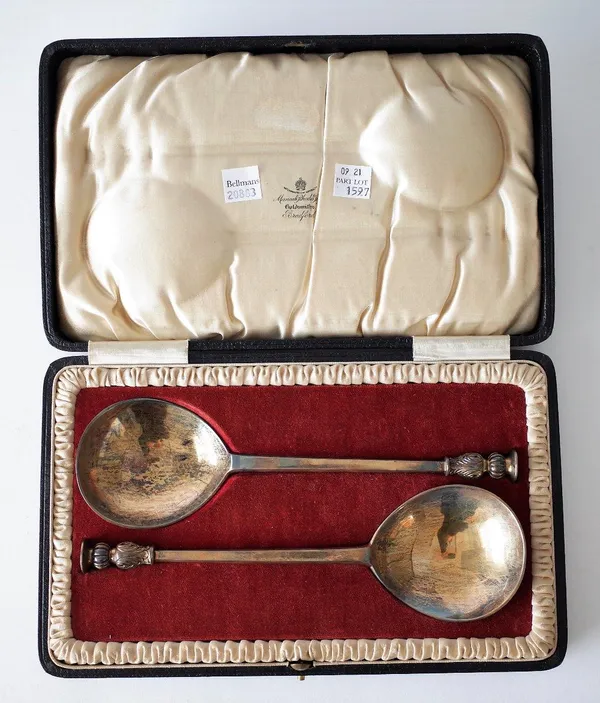 TWO SIMILAR SILVER SERVING SPOONS (2)
